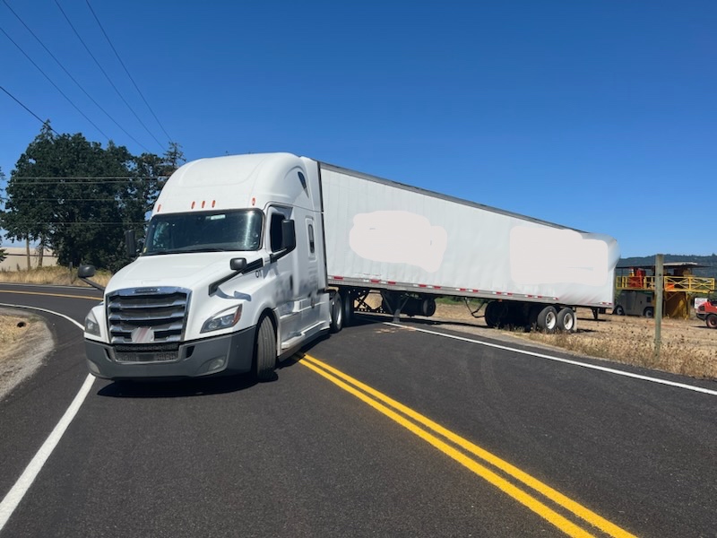 truck stuck on road in Jefferson